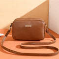 Women's square shoulder bag in PU material with a 3D front pocket, shown in a solid colour.