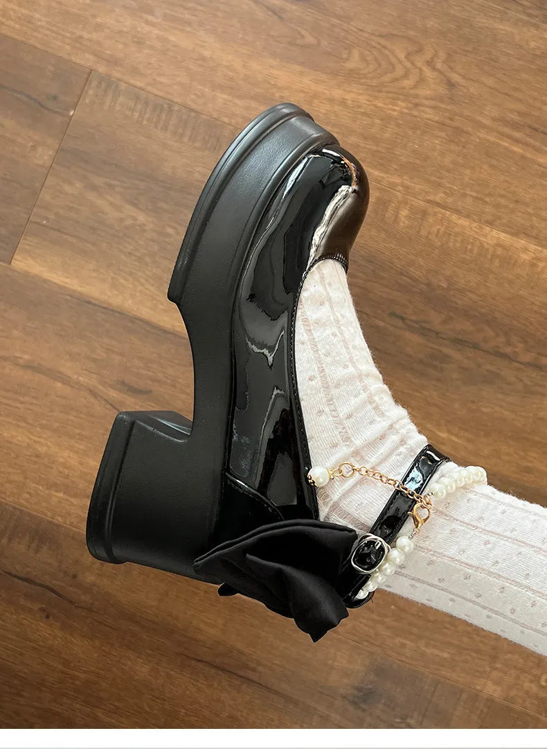 Women's beige and black PU Mary Jane shoes with a 6cm chunky heel and shallow round toe.